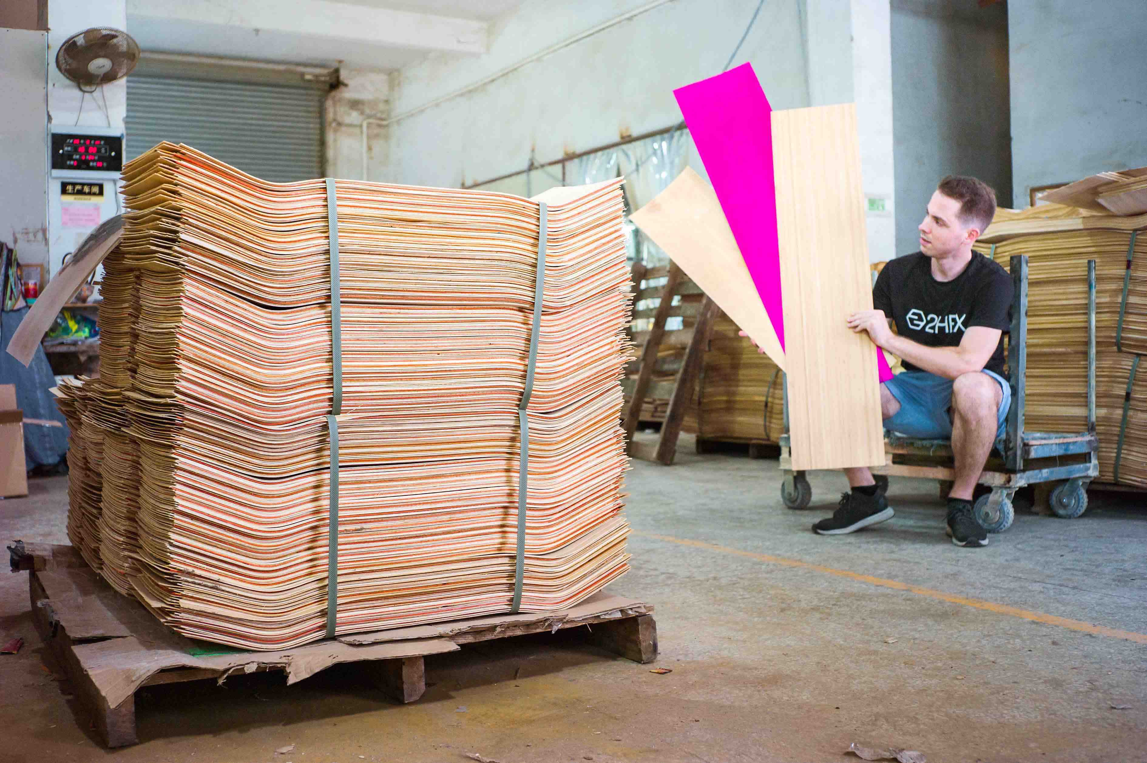 Uncut skateboard decks inside skateboard factory