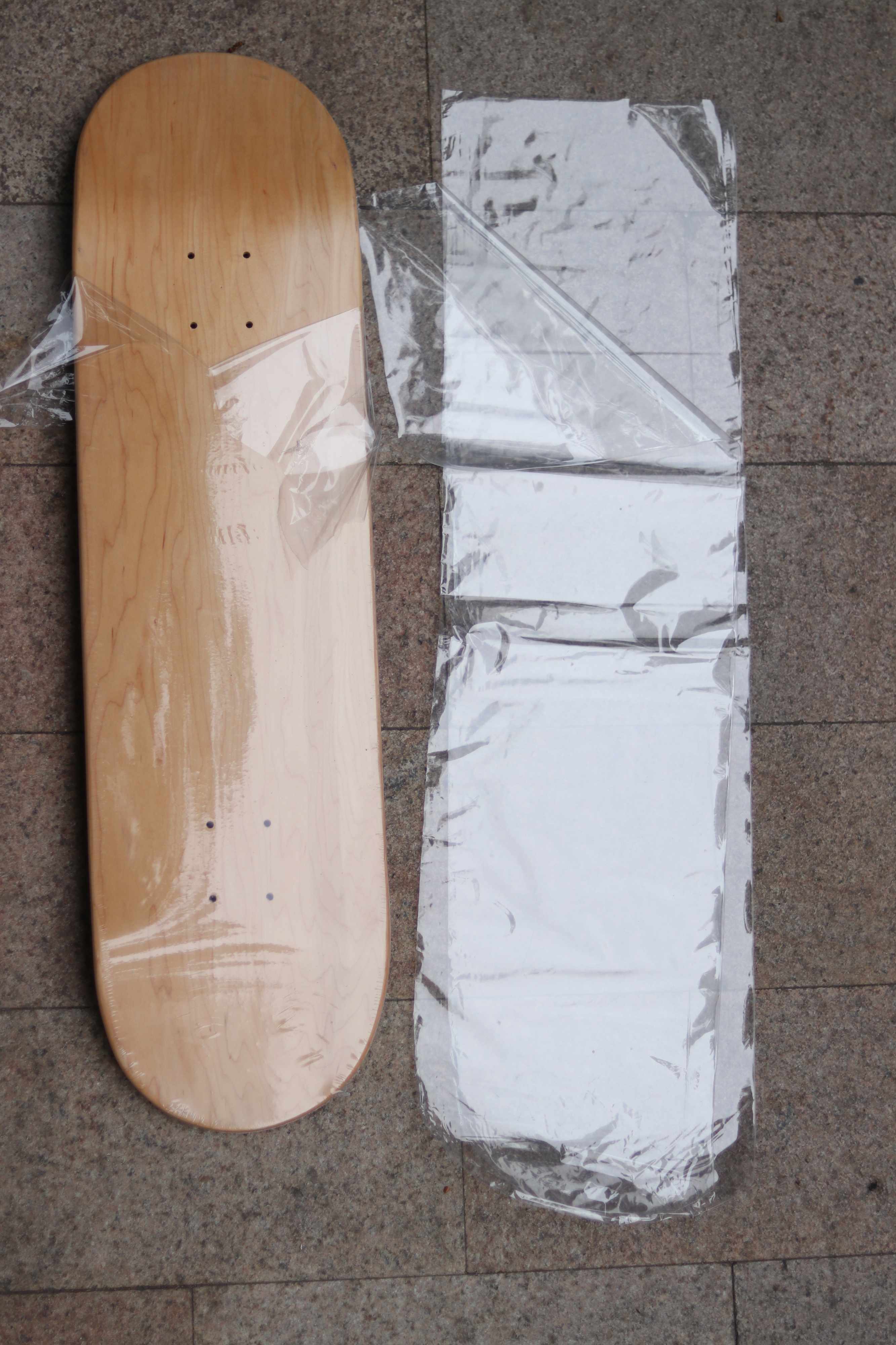We don't just use shrink wrap bags to pack our decks but also sell shrink wrap bags in bulk. Either in small quantities to our deck or heat transfer customers, or by themselves starting at 10,000 pcs for 1,500 USD.