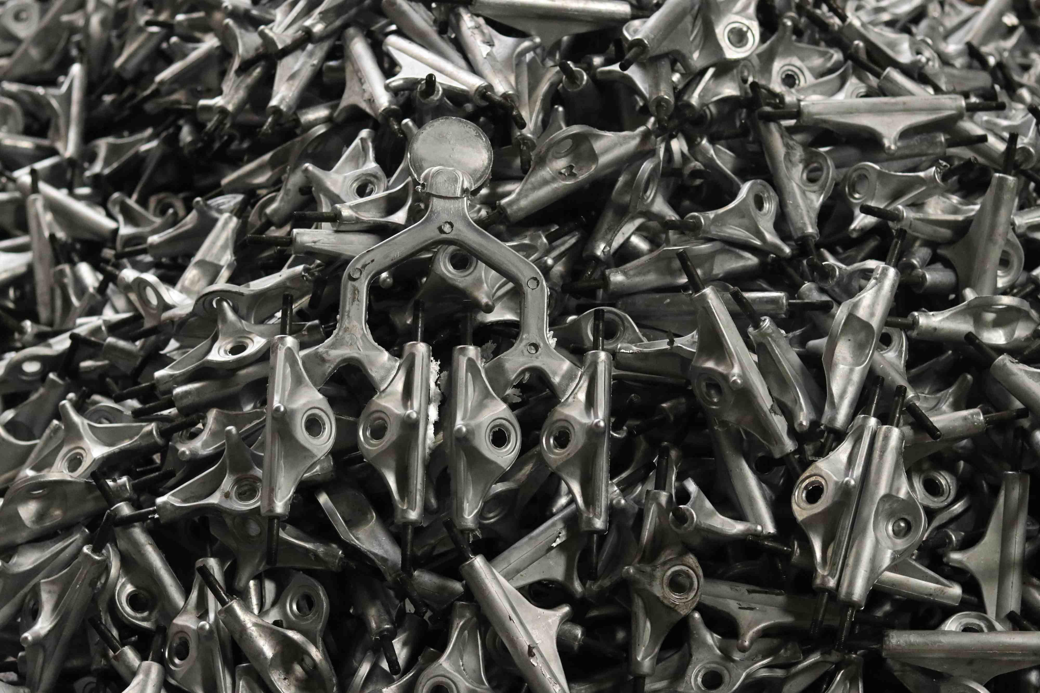 Skateboard truck hangers coming out of the mould after being moulded at 2hex' skateboard truck factory in China