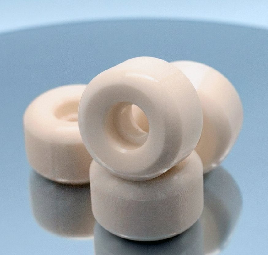 yellowish white wheels like bones or spitfire but made at 2hex skateboard factory